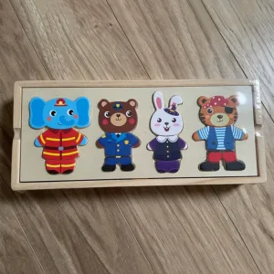 Primit Set Puzzle din Lemn pentru Îmbrăcare de la clientul C****e.
